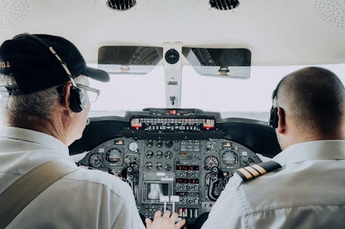 Free Back View of Pilots on Cockpit Stock Photo