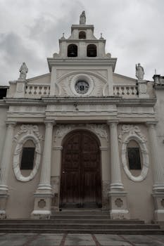 Beautiful facade of a historic Catholic church in Mérida, Venezuela, showcasing classic architectural design.