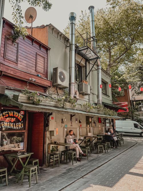 Free Discover an outdoor cafe on a cozy street in Istanbul, Turkey. Stock Photo