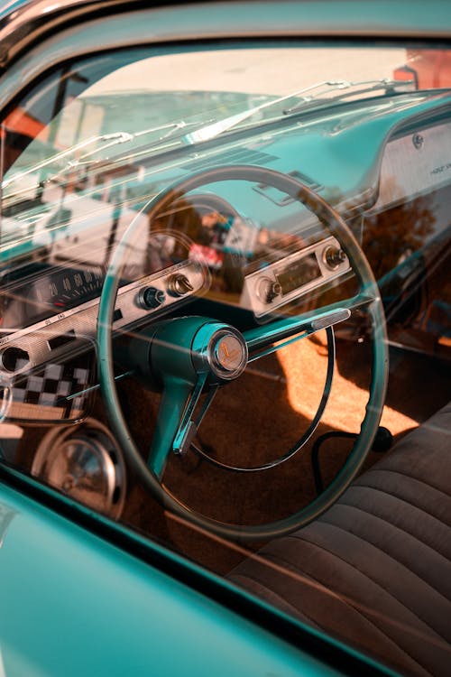 Close Up Photo of a Vintage Car Steering Wheel