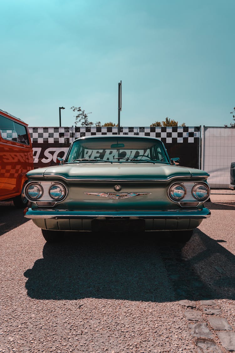 A Chevrolet Corvair Parked On The Street