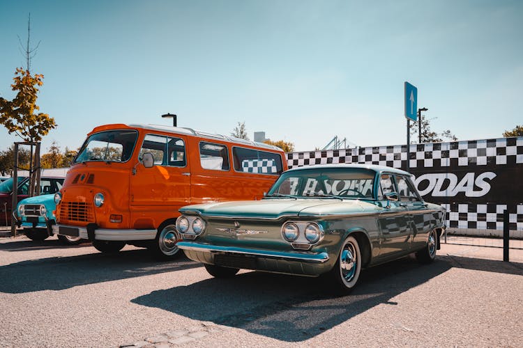 Vintage Cars Parked At A Parking Lot