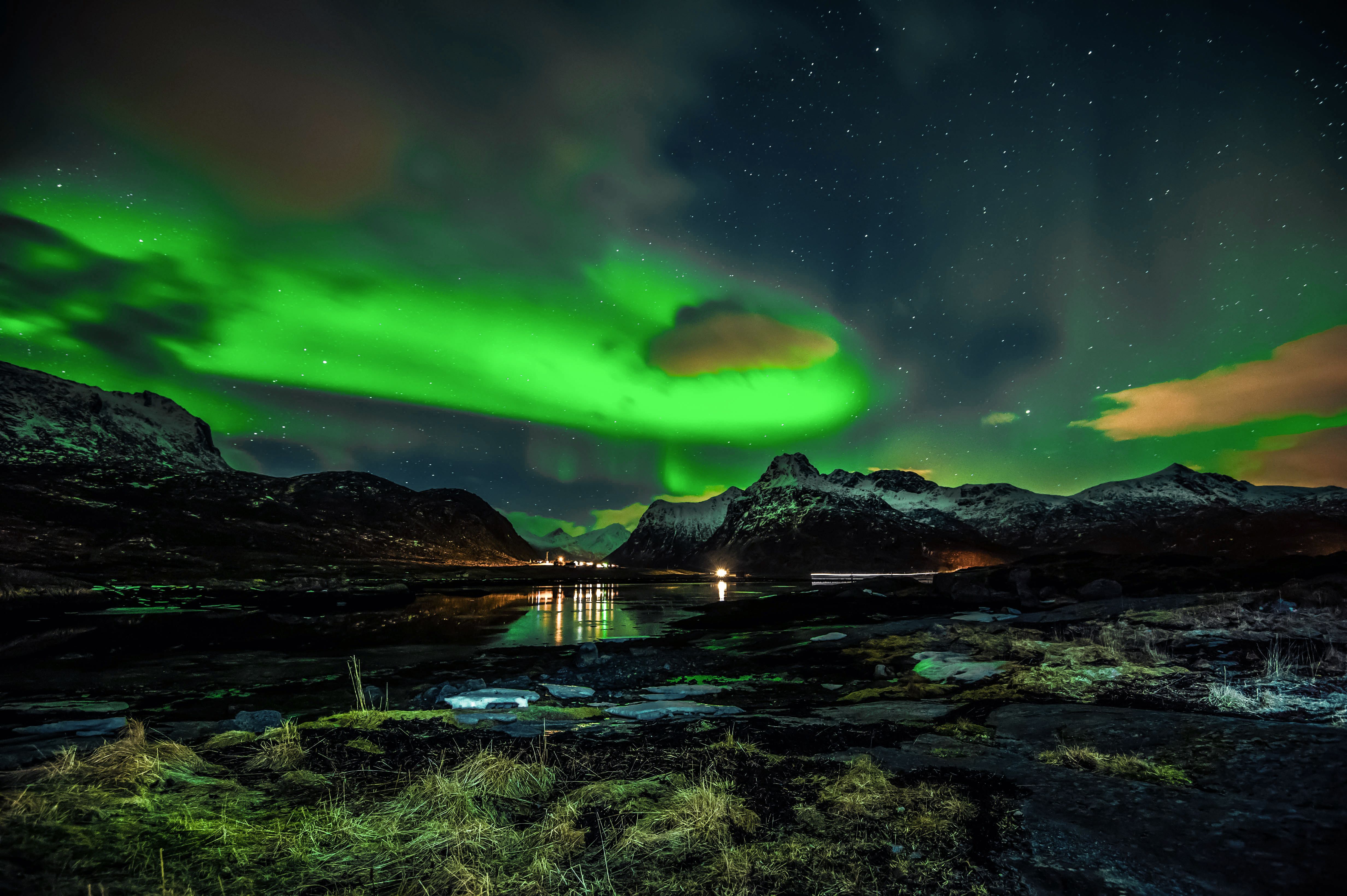 Northern lights activity on sky in Lofoten islands · Free Stock Photo