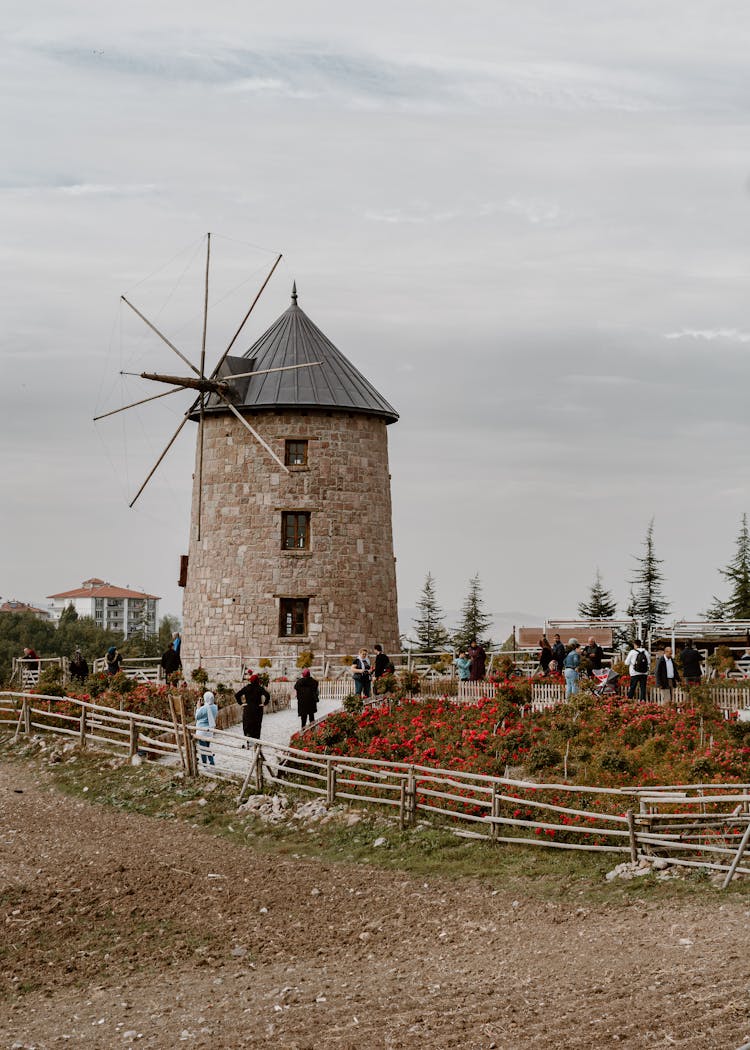 People Visiting An Old Windmill In Ankara, Turkey 