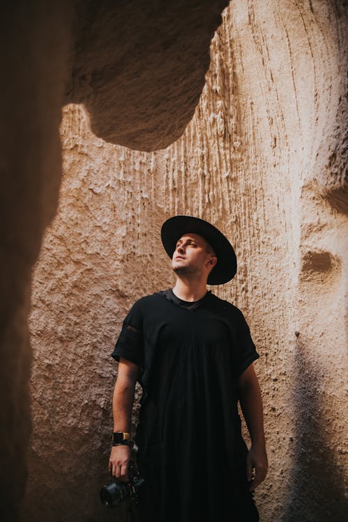 Man Posing among Rocks