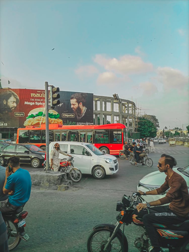 Motorcycles And Cars On Street