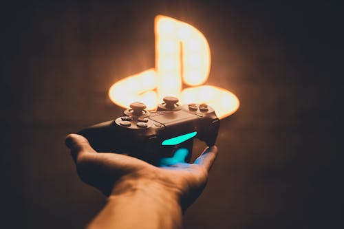 Gratis lagerfoto af hånd, neonskilt, PlayStation