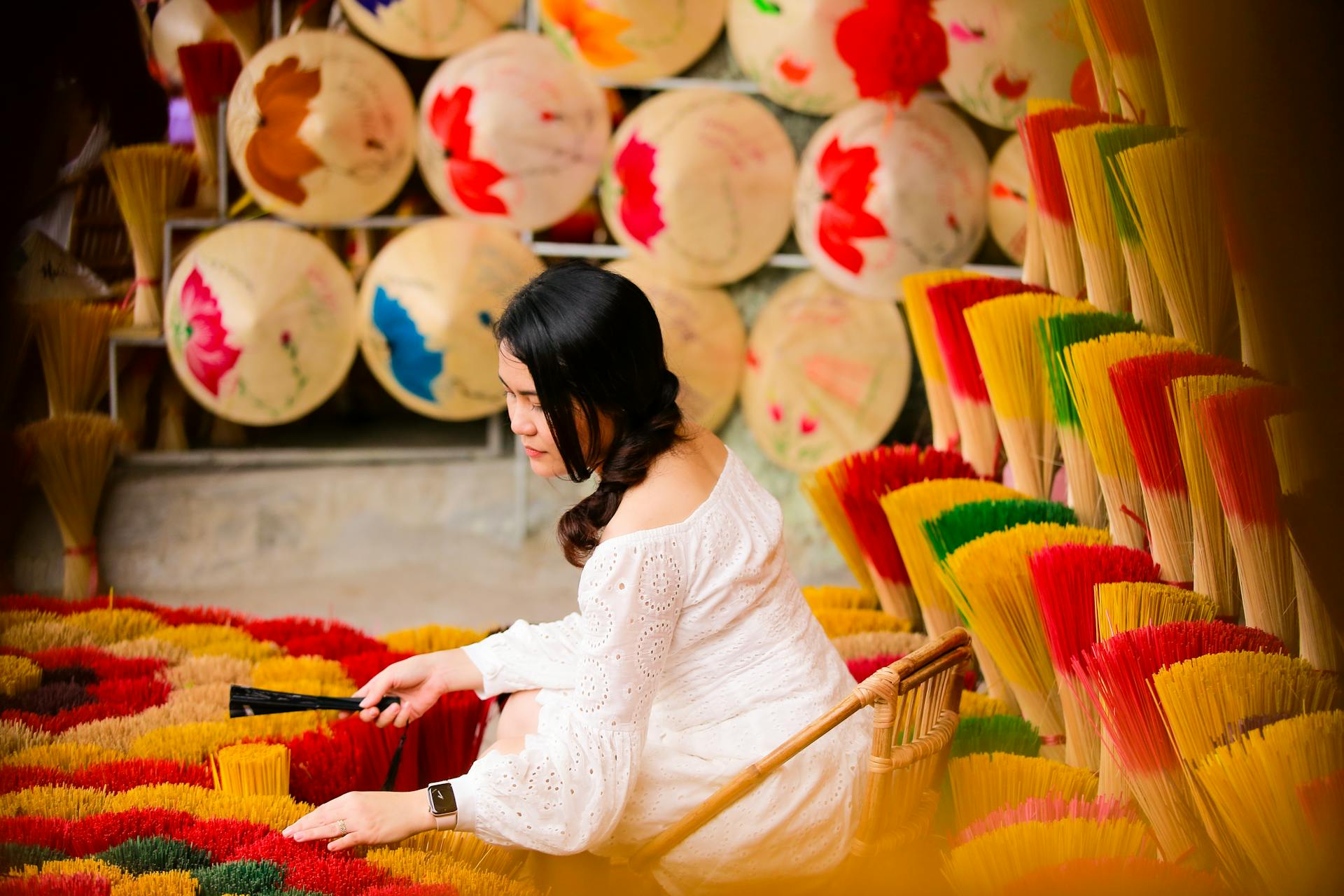 Woman in White Long Sleeve Shirt Sitting on Floor