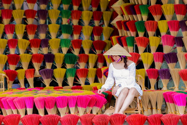 Merchant At Market Stall