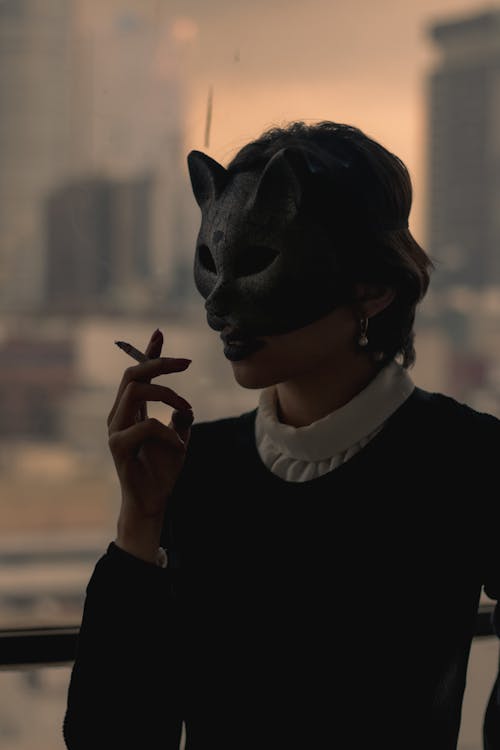 A Woman Wearing Cat Mask