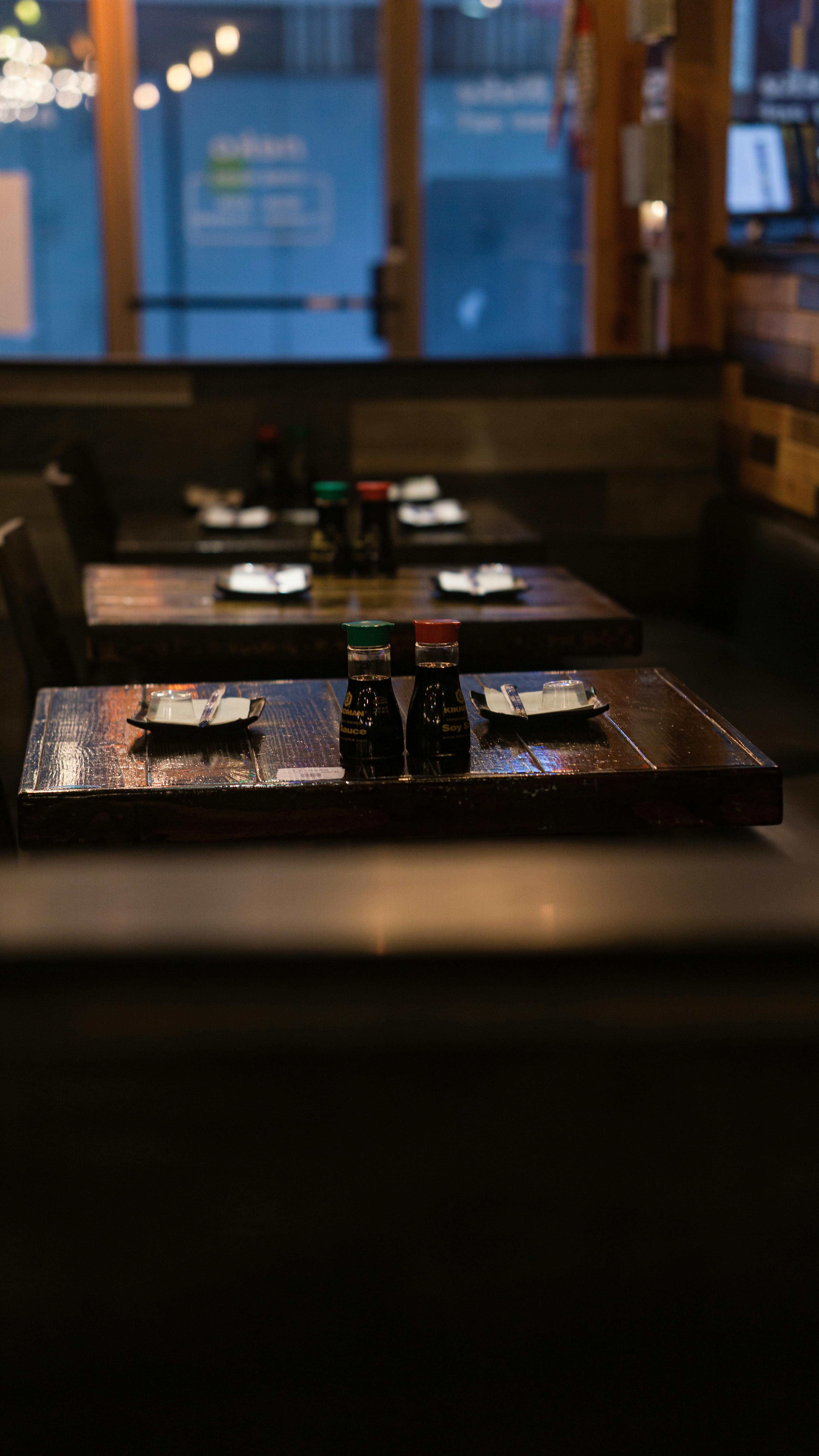 Flasks on Tables · Free Stock Photo