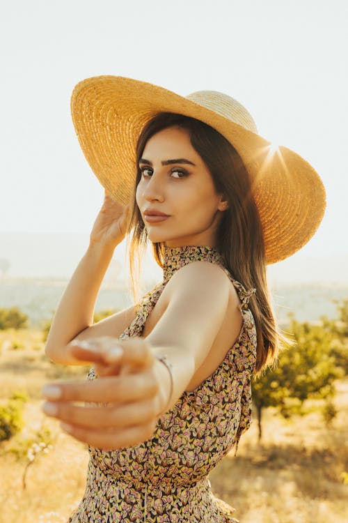 Photo of Woman Wearing Sun Hat