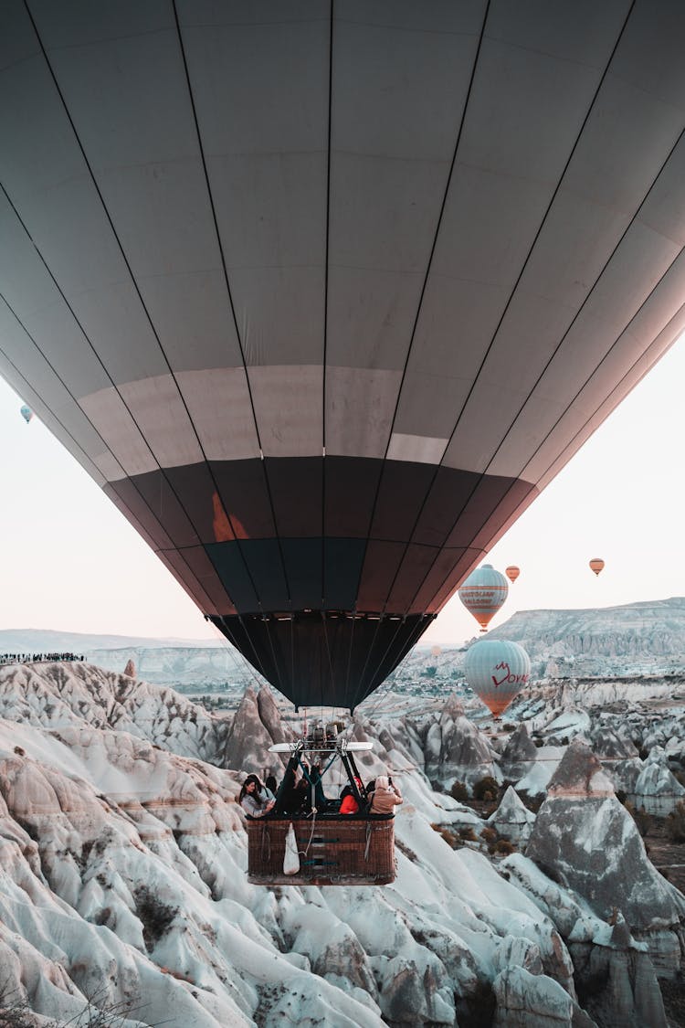 People Riding In A Hot Air Balloon