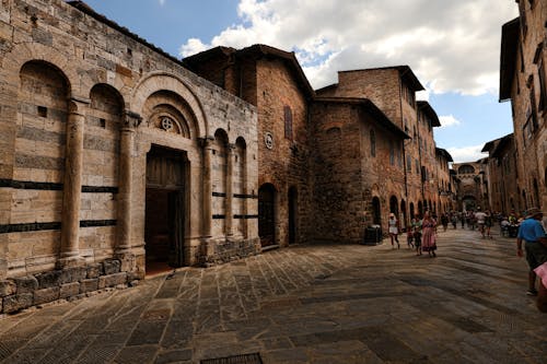 Безкоштовне стокове фото на тему «san gimignano, алея, будівлі»