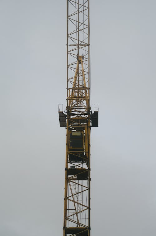 Free Yellow Metal Crane Under White Sky Stock Photo