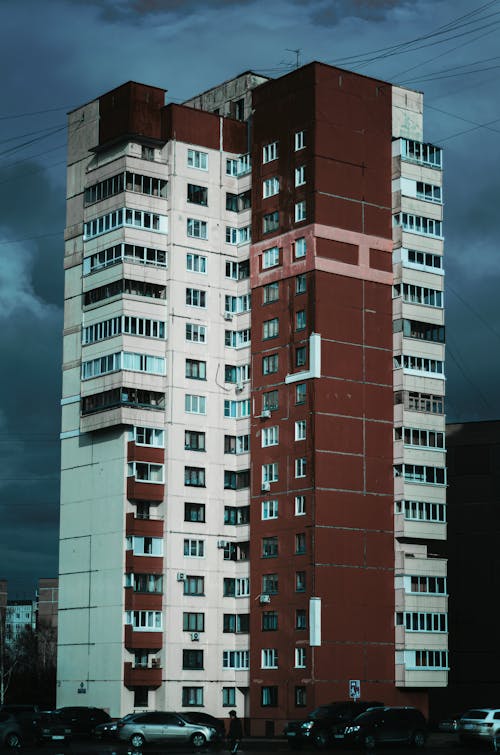 Brown and White Concrete Building Under Blue Sky