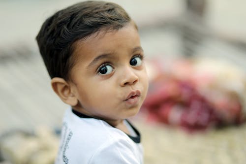 Kid's Face in Close Up Photography