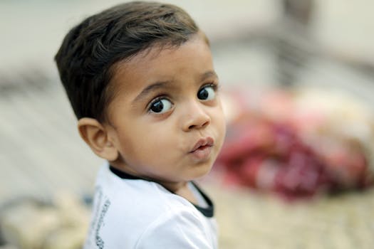 Adorable close-up portrait of a young child with captivating eyes.
