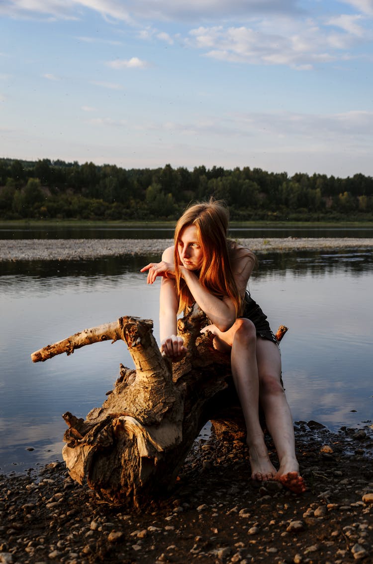 Woman Bored By River