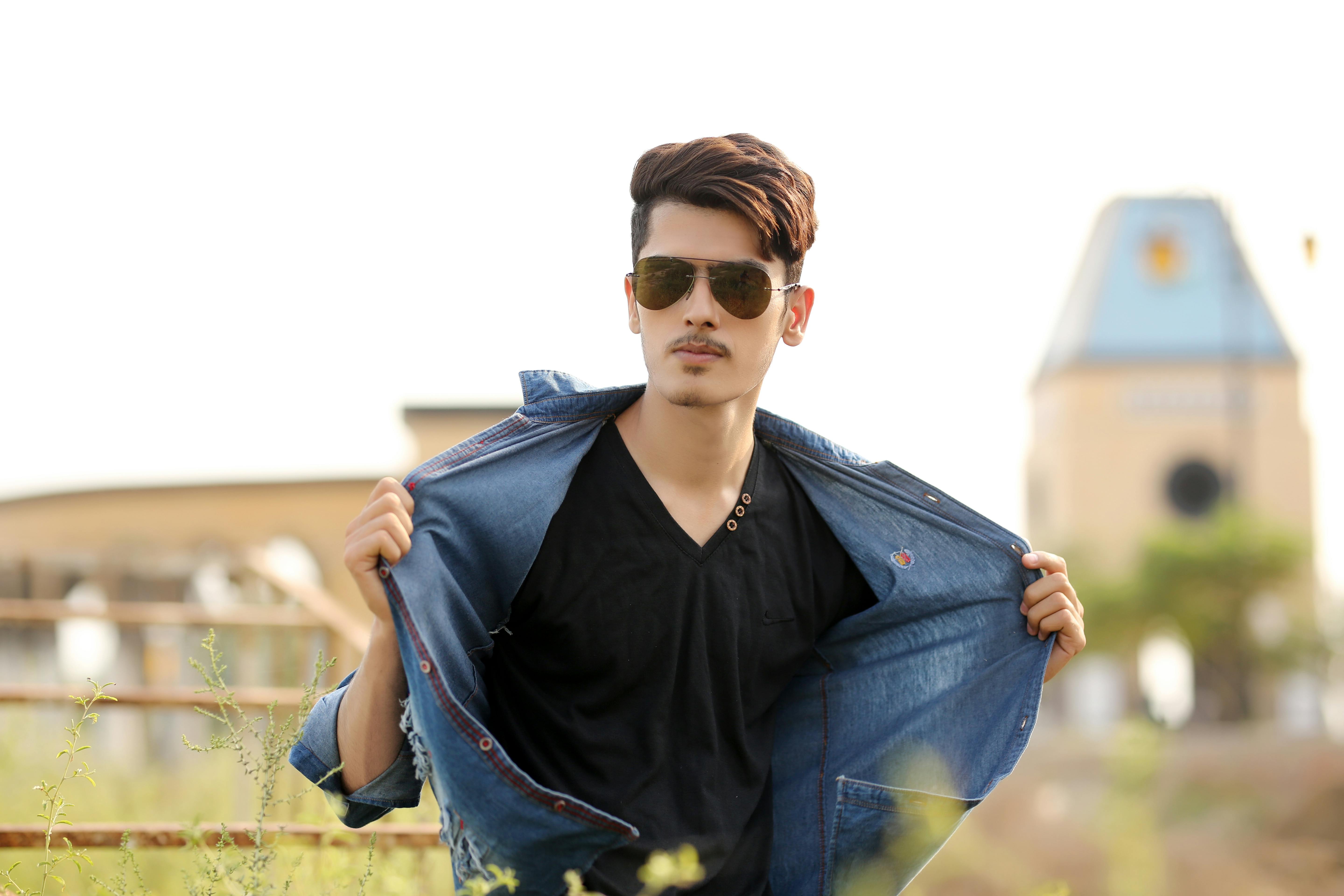 Portrait of young stylish indian man model pose in street. 10499155 Stock  Photo at Vecteezy