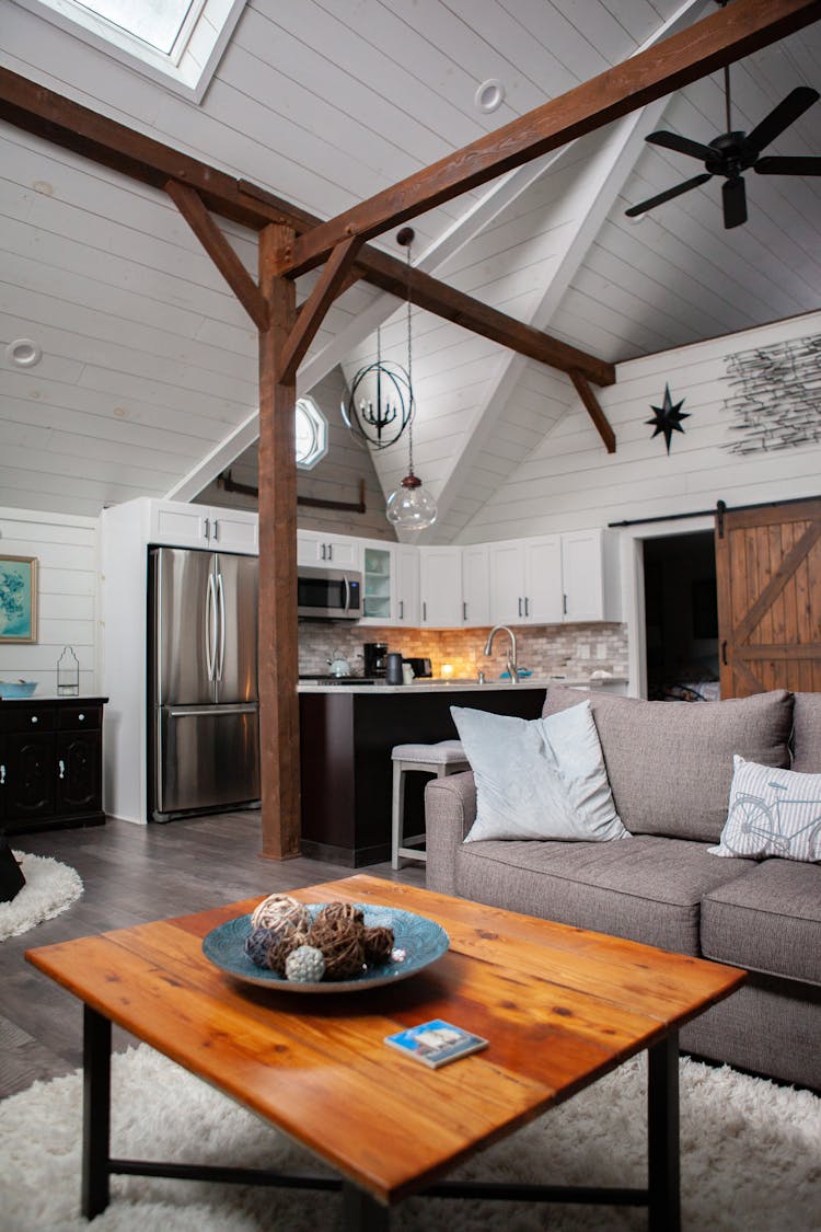 Kitchen And Living Room In Wooden House