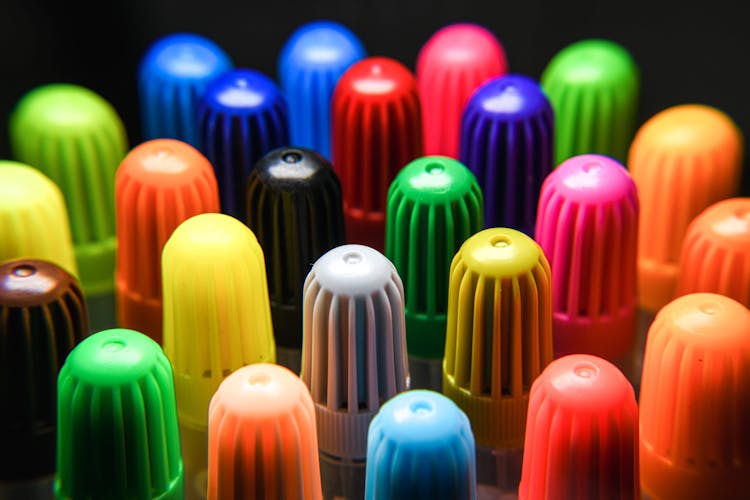 Plastic Caps Of Colored Markers