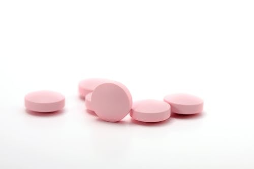 Close-Up Shot of Pink Pills 