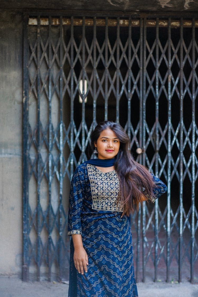 Woman In Dress In Traditional Pattern