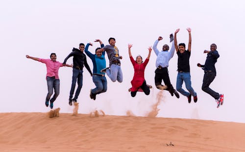 Photograph of People Jumping