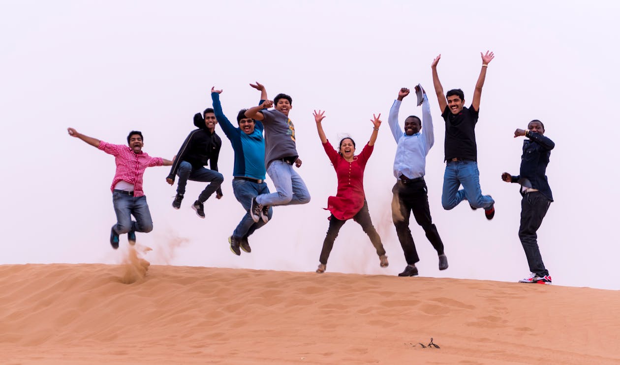 A Jump Shot Photo of a Group of People