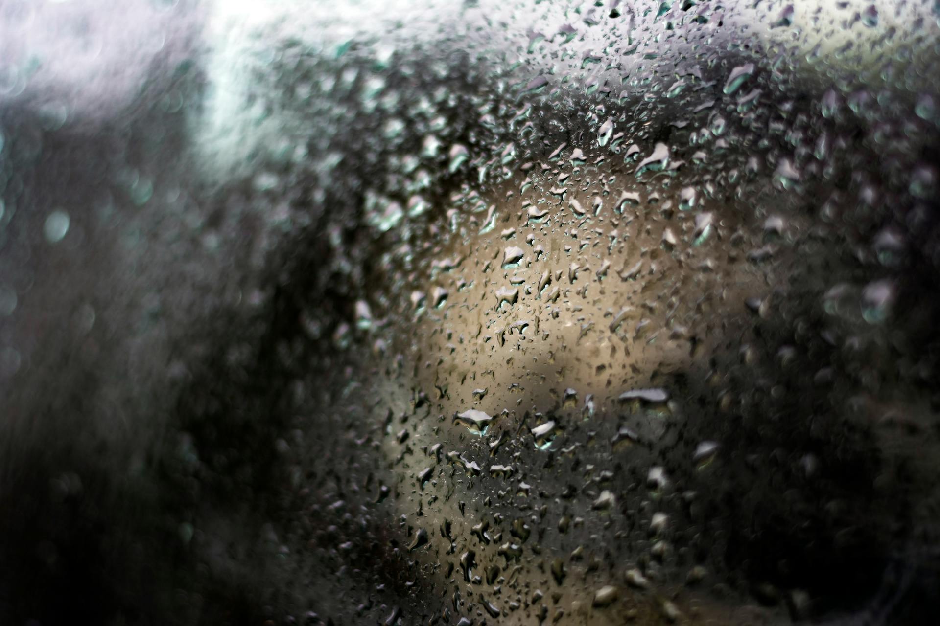 Water Droplets on Glass Panel