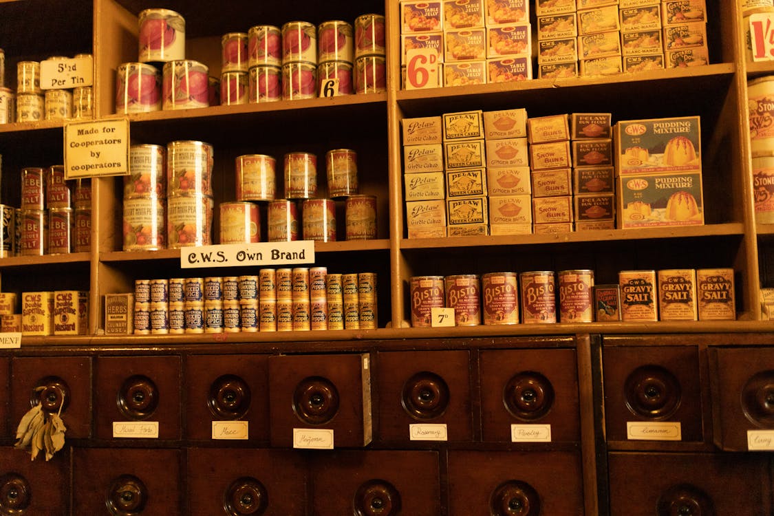 vintage-wooden-cupboard-with-vintage-cans-and-boxes