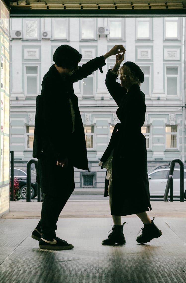 Woman And Man Dancing On Stage