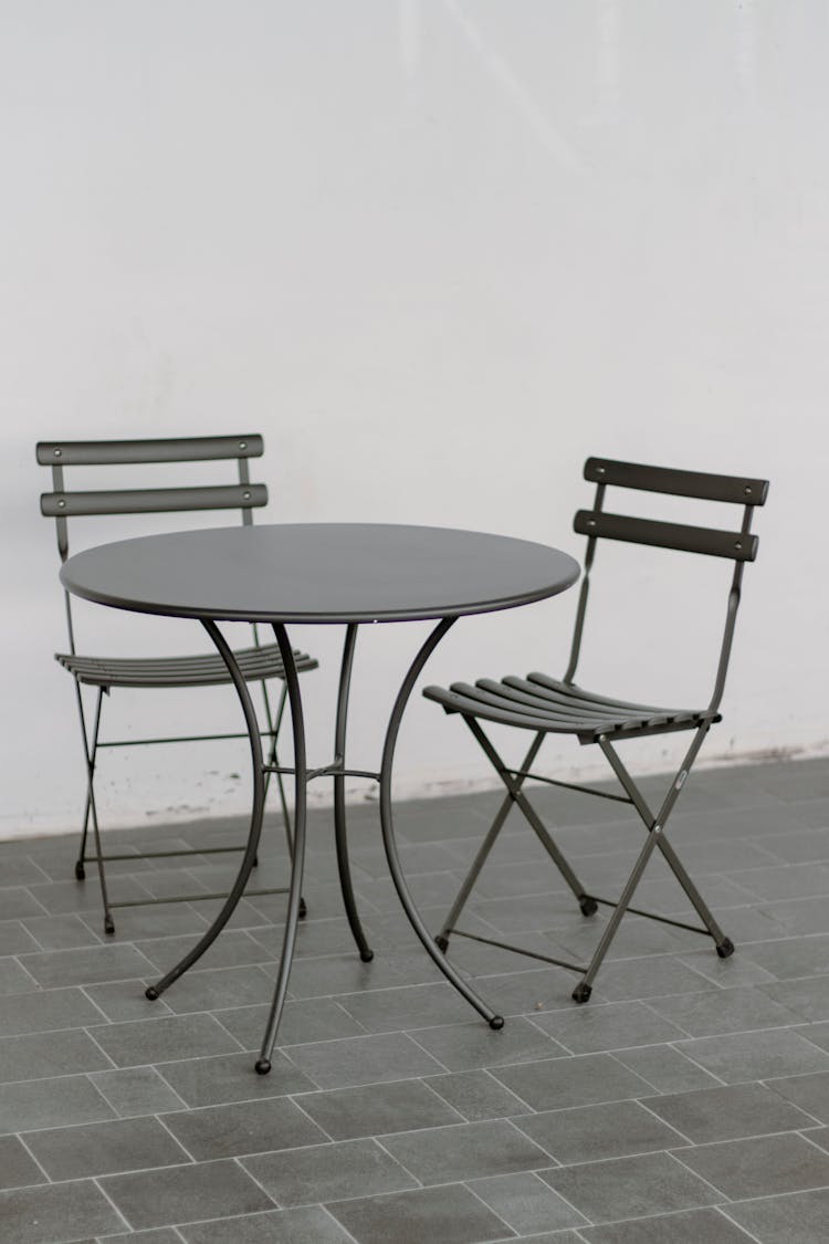 Metal Chairs And A Metal Table