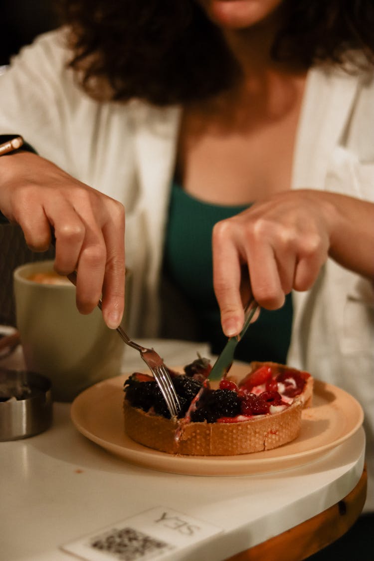 Woman Cutting Cake