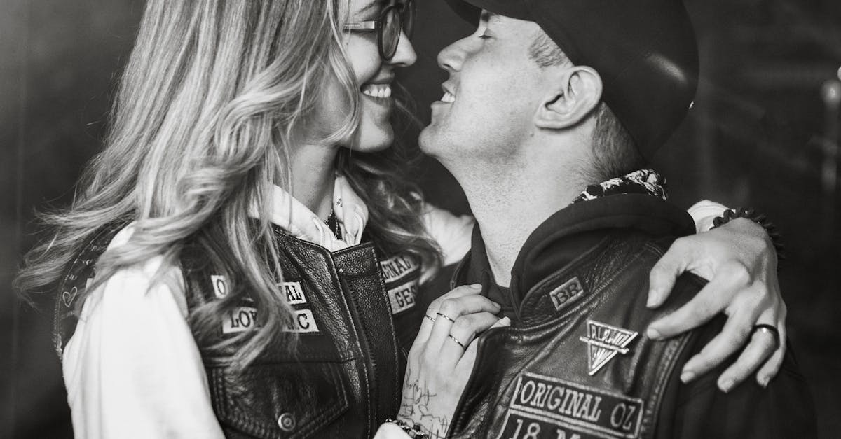 Couple in Jackets Hugging · Free Stock Photo