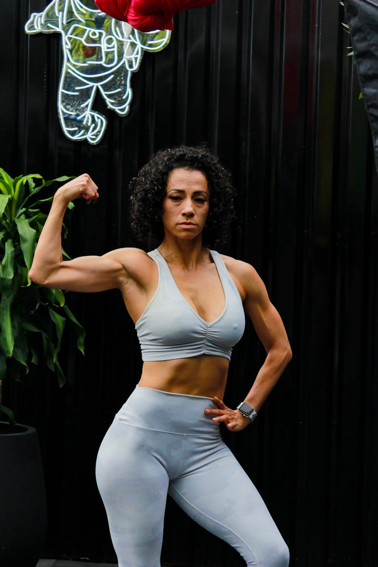 A Woman Flexing Her Biceps