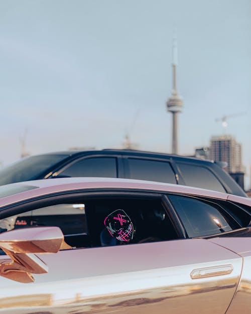 Mask behind Cars Window