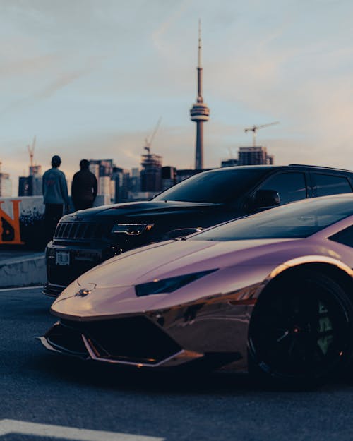 Sports Car Parked on Concrete Pavement