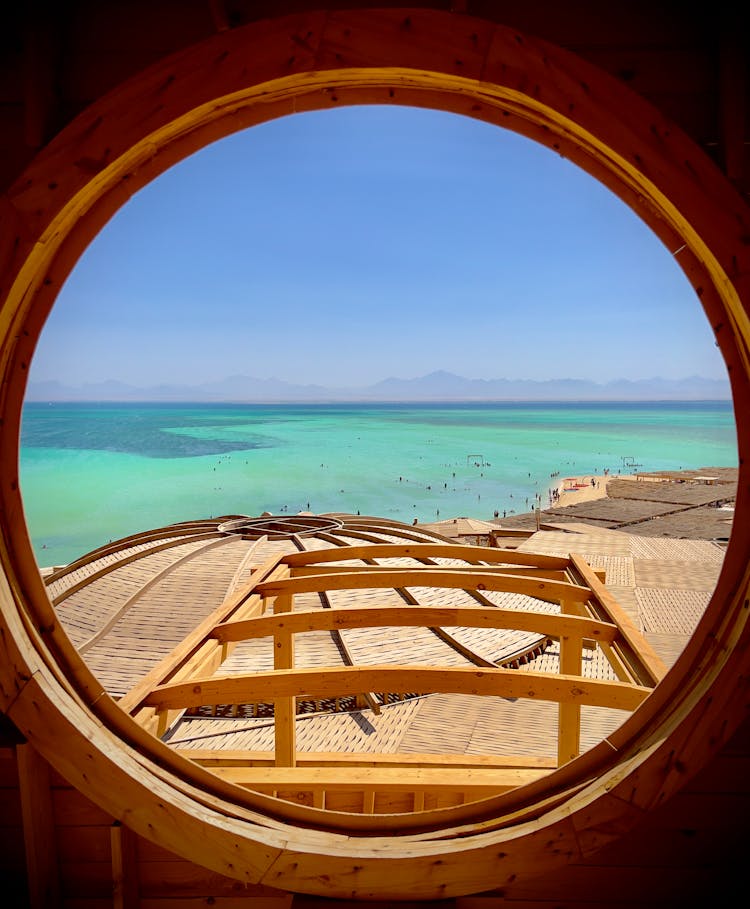 Beach View From A Round Window