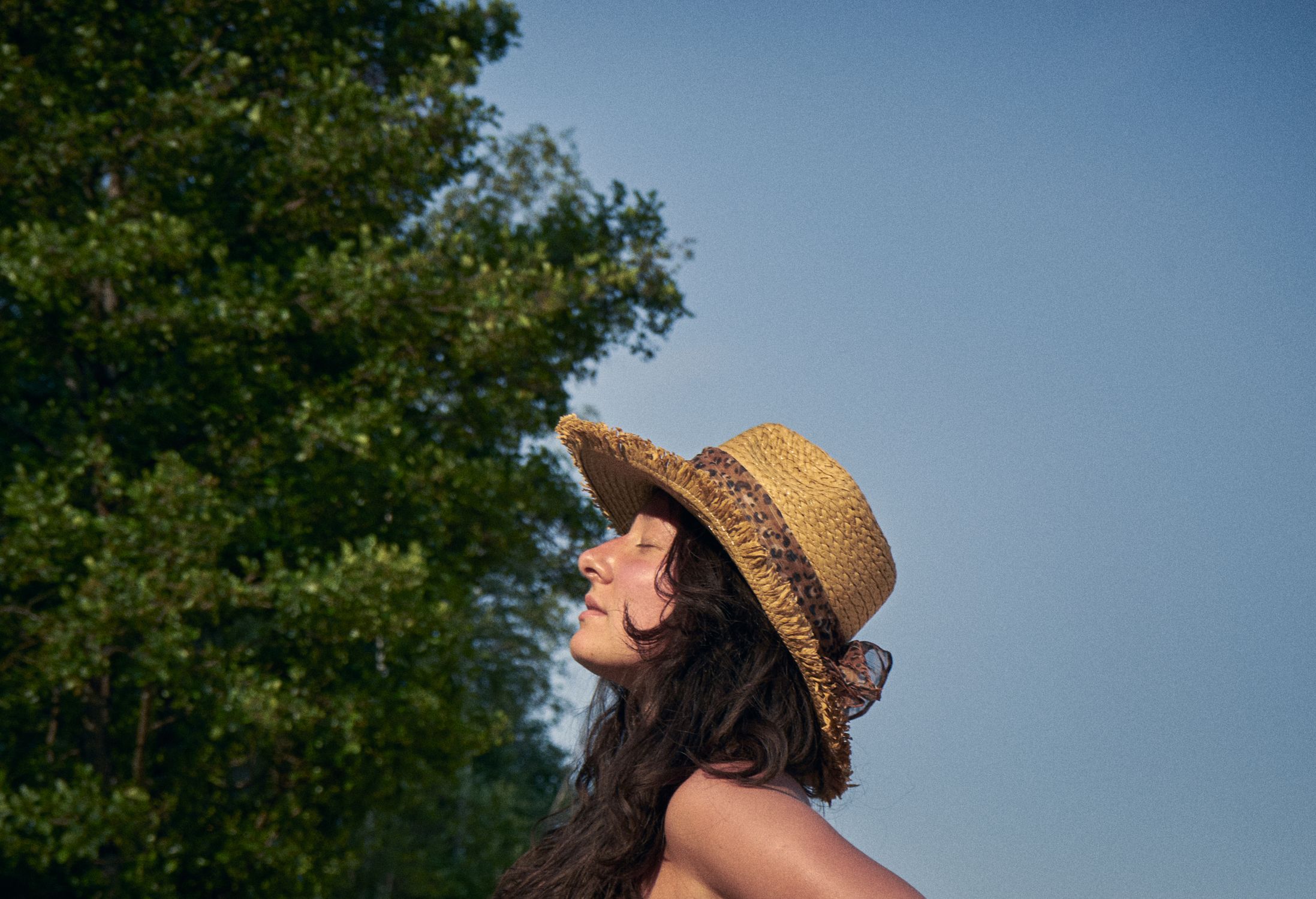 A Woman in Brown Hat · Free Stock Photo
