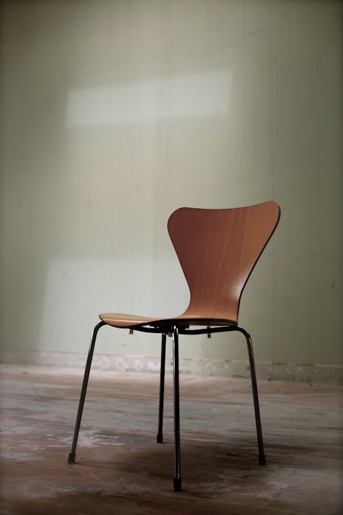 Brown and Black Chair on Brown Surface