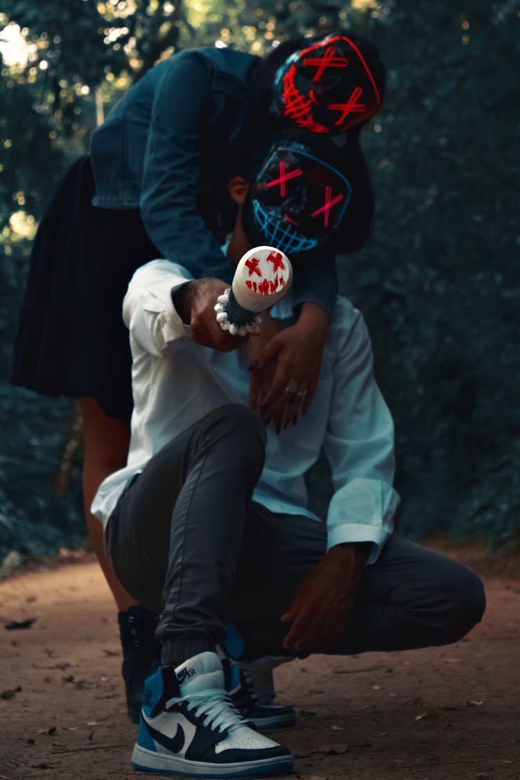 Couple In Bizarre Masks