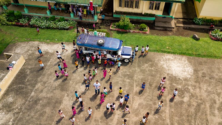 Drone Photography Of People In A School 