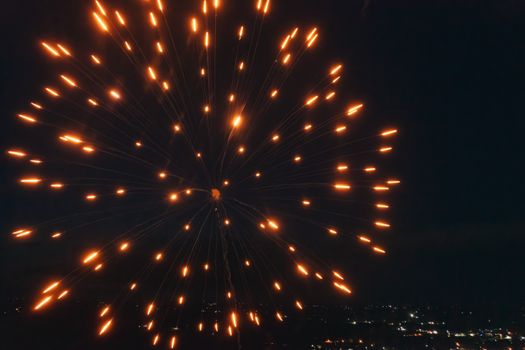Vibrant firework display lighting up the night sky in Plainview, Minnesota.