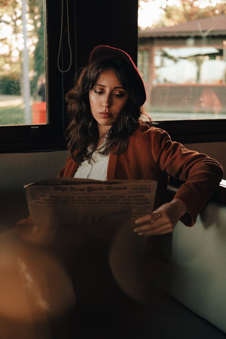 Woman Reading Newspaper