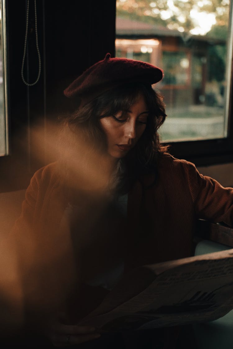 Woman In Hat Looking Down