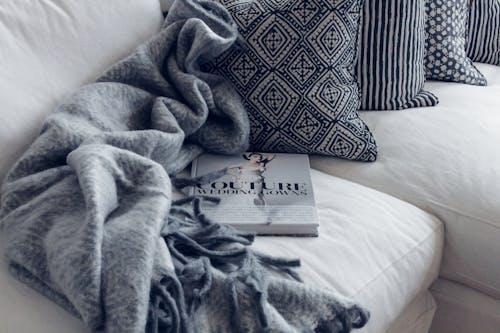 Free Couture Book on Sofa Stock Photo