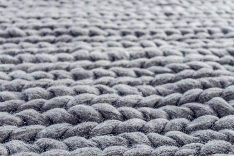 Close-up Of Gray Cable Knit Cloth