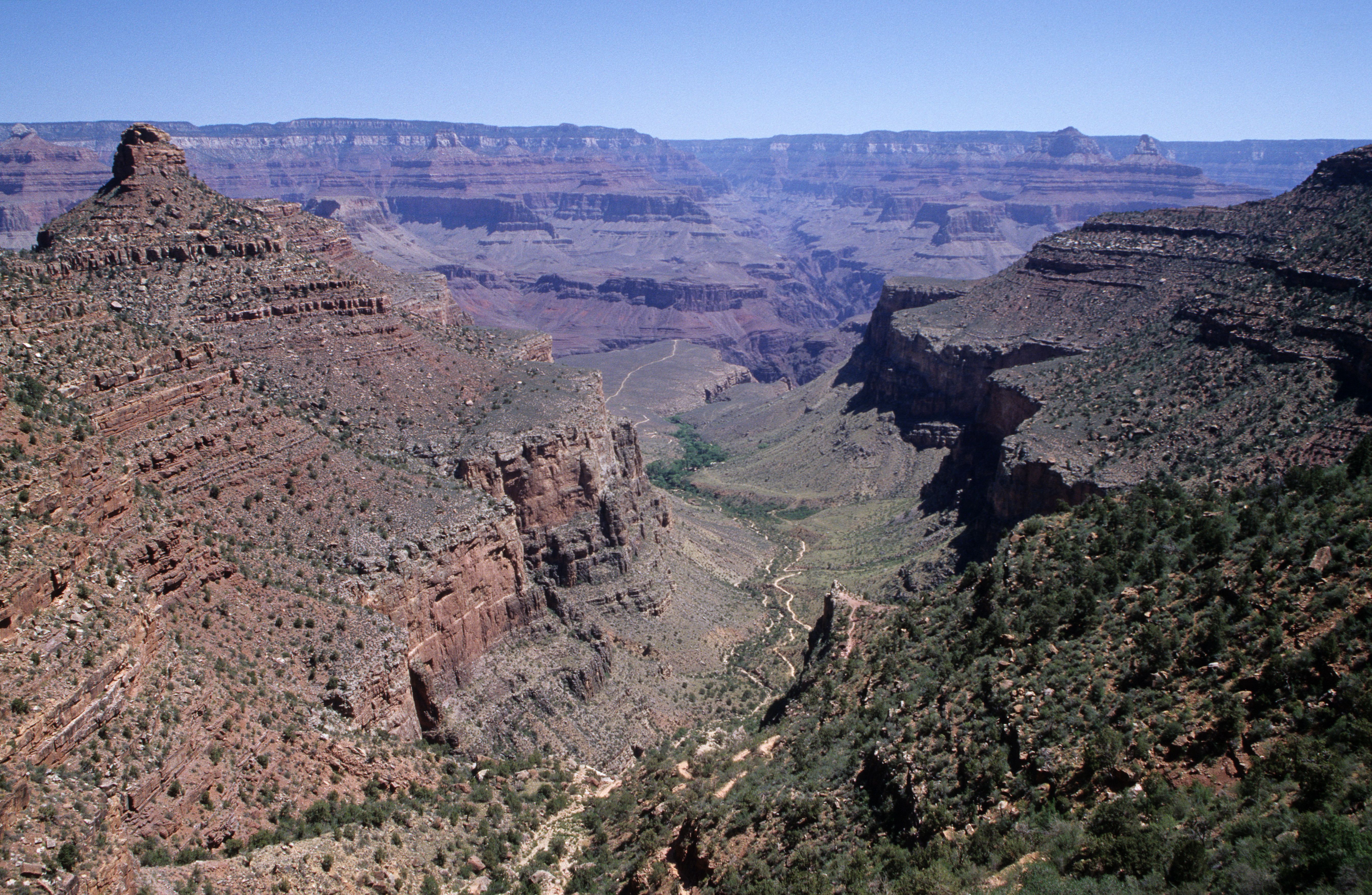 Unbeatable 25-min Grand Canyon South Rim EcoStar Helicopter Tour with Optional Hummer Review Review 2026 - Stunning aerial view of the Grand Canyon, showcasing its rugged terrain and vibrant colors.